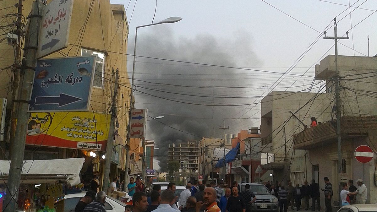 A deadly day in Iraq: Three car bombs in two cities kill at least 30