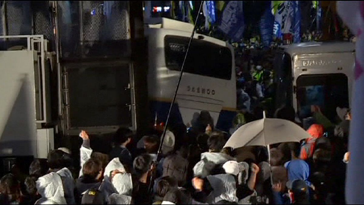 South Korean police clash with ferry victim relatives