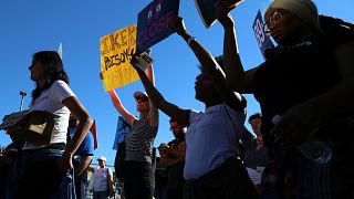 Image: People attend a protest to shut down Rikers Island prison