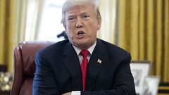 Image: President Donald Trump speaks to members of the media