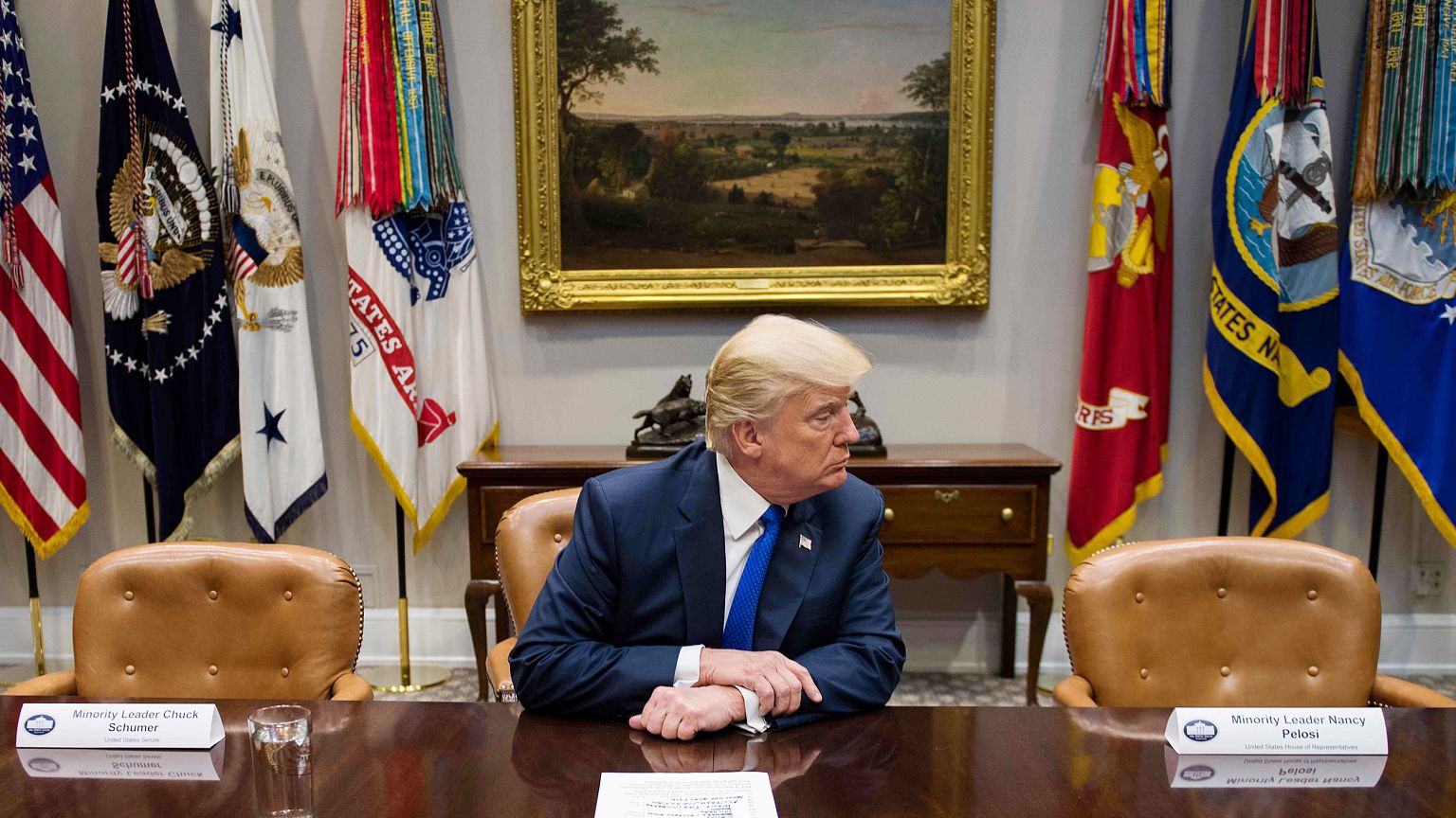 Image: US President Donald Trump (C) makes a statement from the Roosevelt R