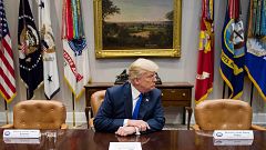 Image: US President Donald Trump (C) makes a statement from the Roosevelt R