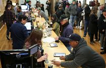 Image: Customers purchase marijuana at a dispensary in Oakland on the first