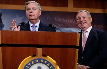 Image: Graham, with Durbin, talks about possible legislation for so-called