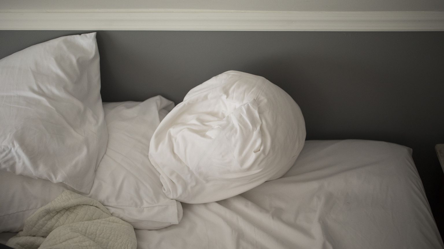 Image: An unmade bed