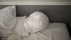 Image: An unmade bed