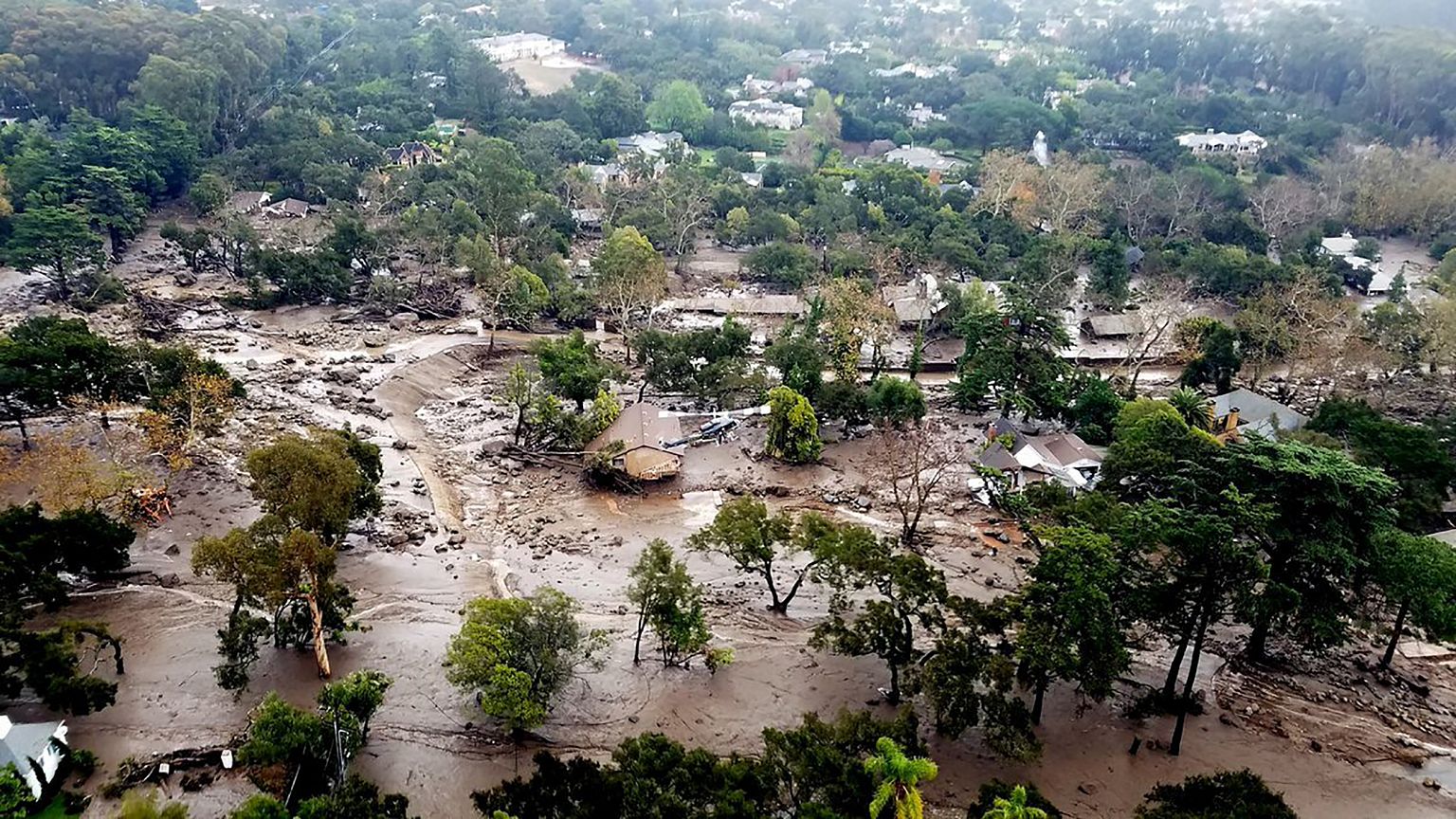 Image: Mudflow and damage from mudslides are pictured in this aerial photo 