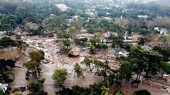 Image: Mudflow and damage from mudslides are pictured in this aerial photo 
