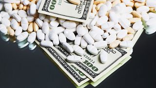 Prescription medication and one hundred dollar bills