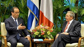 Hollande meets Castro brothers during French state visit to Cuba