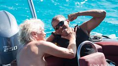 Image: Obama kids around with Richard Branson in Moskito on the British Vir