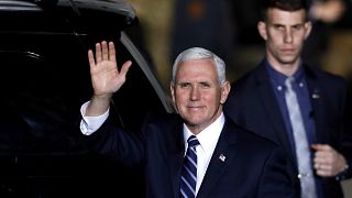 Image: Vice President Mike Pence waves after arriving at Ben Gurion Interna