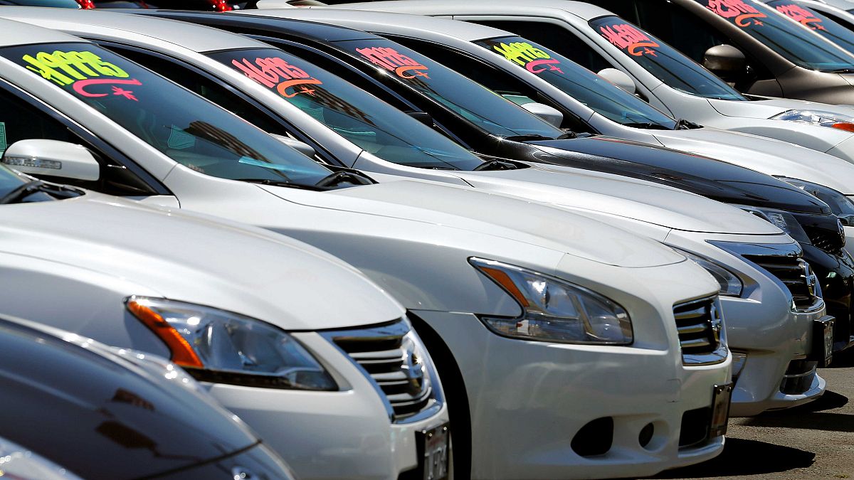 Image: Automobiles are shown for sale at a car dealership in Carlsbad, Cali