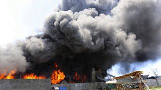 Poor safety standards blamed as dozens die in Philippines rubber factory fire