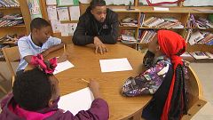 Image: Aaron Maybin speaks to students at Matthew A. Henson Elementary Scho