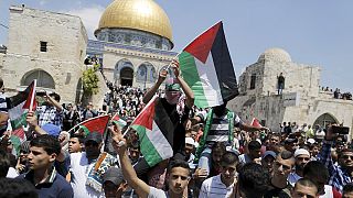 Palestinians demonstrate and march to mark Nakba Day