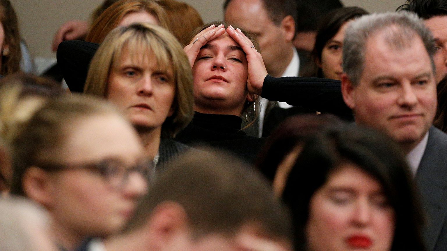 Image: A victim reacts as Larry Nassar speaks during his sentencing hearing