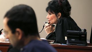 Image: Judge Rosemarie Aquilina watches as Larry Nassar listens to impact s
