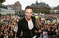 Sweden's winning Eurovision singer gets 'heroes' welcome