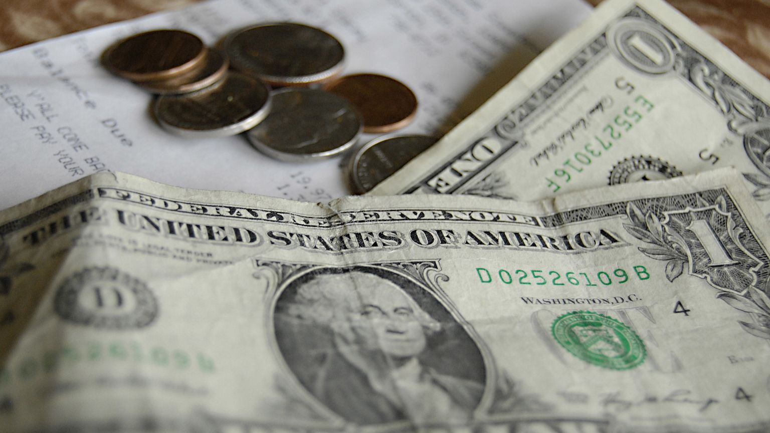 Image: A waiter's tip on a check