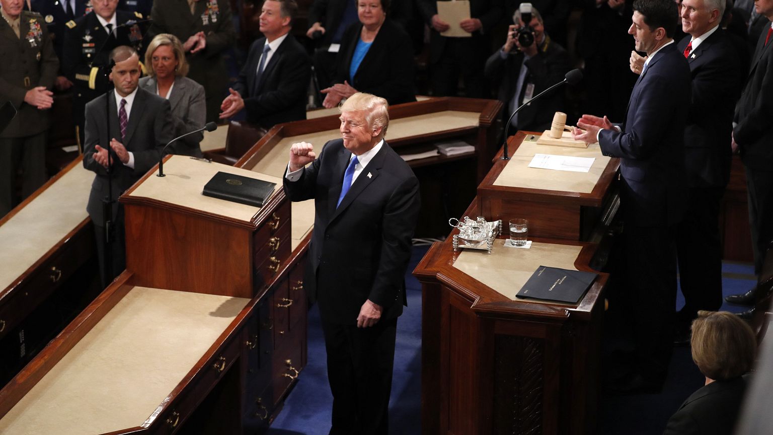Image: Trump is greeted as he arrives to deliver his State of the Union add