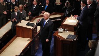 Image: Trump is greeted as he arrives to deliver his State of the Union add