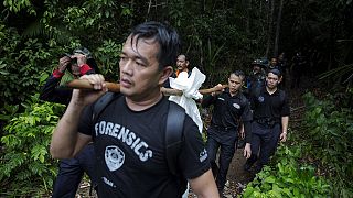 Malaysia: Police officials arrested as over 100 'migrant graves' discovered