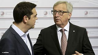 Tsipras negocia con Juncker en Bruselas
