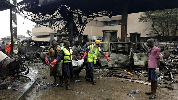 Ghana's president 'heartbroken' after explosion kills around 100 Ghana's president 'heartbroken' after explosion kills around 100