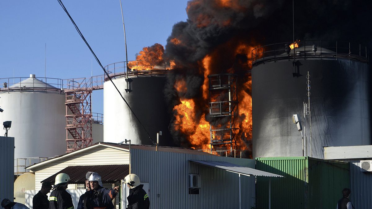 A huge fire rages out of control at a fuel depot in Ukraine
