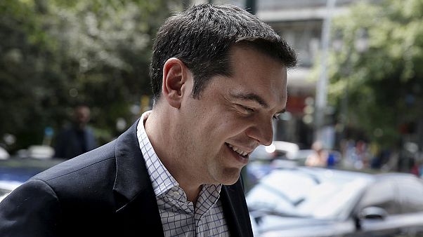 Tsipras, Merkel y Hollande; un trío para desbloquear las negociaciones de la deuda griega Tsipras, Merkel y Hollande; un trío para desbloquear las negociaciones de la deuda griega