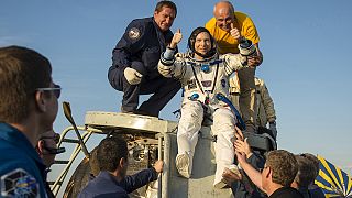 Space trio lands safely after 199 days in orbit