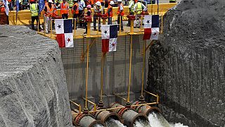 Engineers flood newly-expanded Panama Canal section