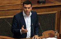 Tsipras says austerity is 'humiliating for our people' as Greek debt talks remain in limbo