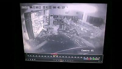 China: dizzy driver crashes car into a pharmacy
