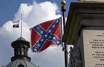 Calls to "take it down" strengthen over Confederate flag in Charleston