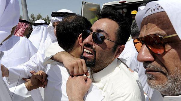 Kuwait: Thousands gather to bury the mosque blast victims Kuwait: Thousands gather to bury the mosque blast victims