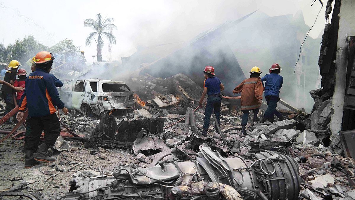 Dozens killed as Indonesian military plane crashes on houses in Sumatra