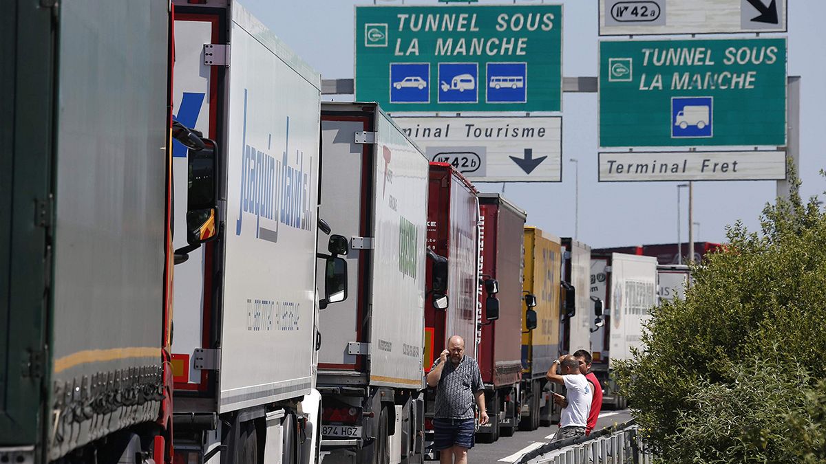 Channel tunnel closed again as ferry workers protest on rails