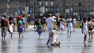 Western Europe sizzles in first heatwave of summer, with no end in sight for some places