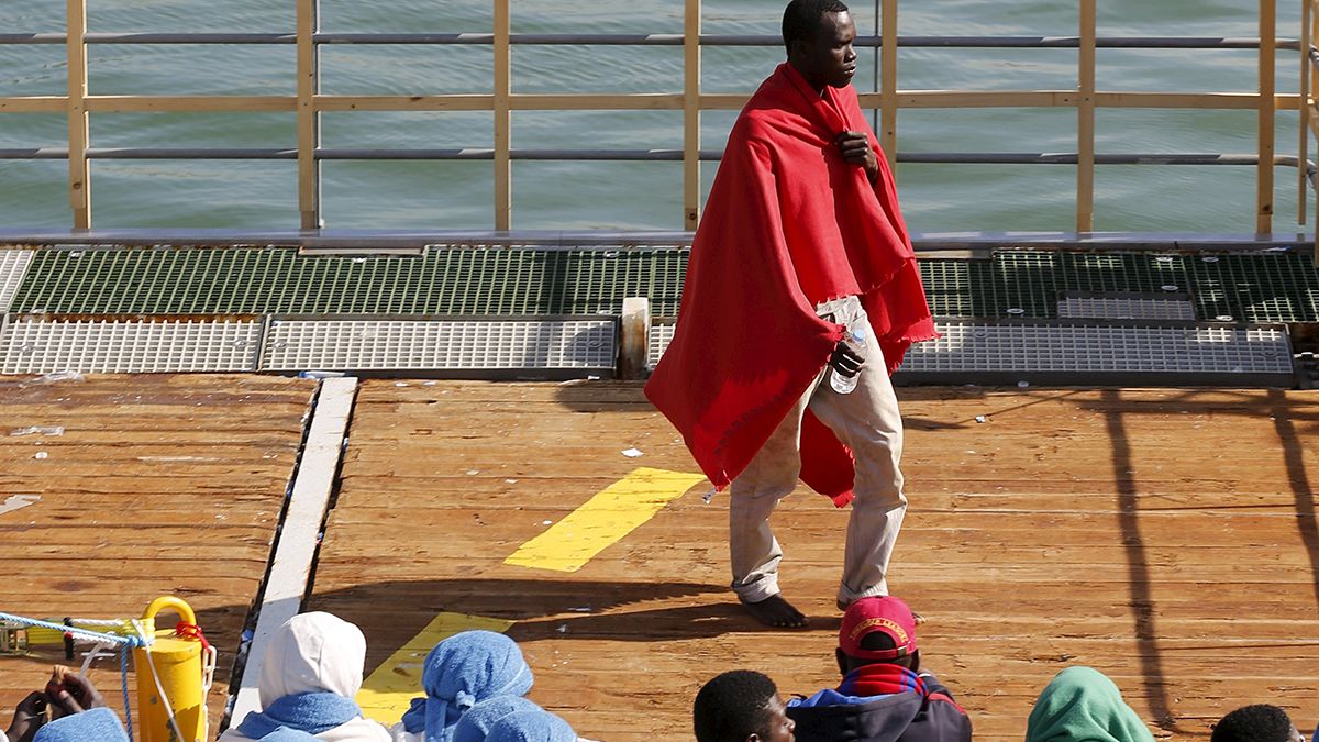 Status approved, but nowhere to go: refugees form makeshift camp in Italy