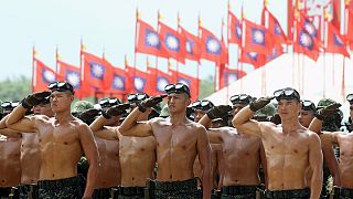 Taiwan defies China with WWII commemoration parade