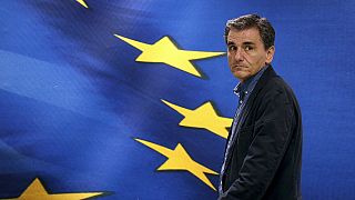 Euclid Tsakalotos sworn in as new Greek finance minister