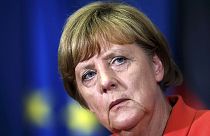 Merkel breaks off dealing with Greece to visit Balkans