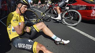 Tour de France leader Martin withdraws with broken collarbone