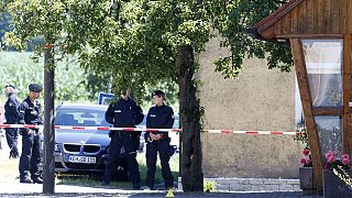 Man held after two killed in German drive-by shootings