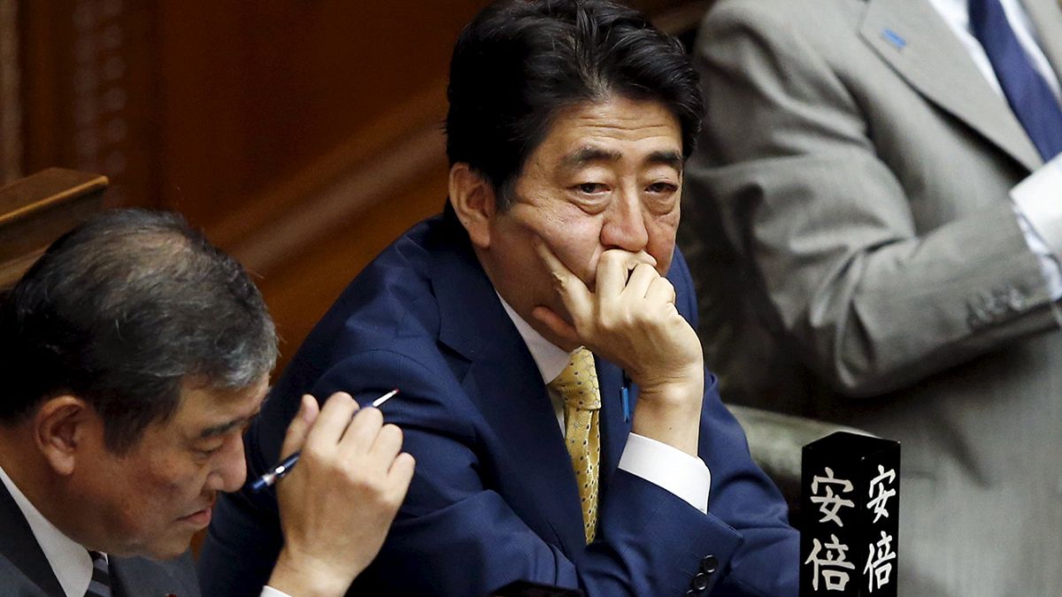 Japan lawmakers approve contentious bills to bolster military presence abroad