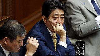 Japan lawmakers approve contentious bills to bolster military presence abroad