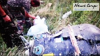 MH17 new footage: rebels discover debris is from a civilian aircraft