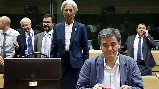 EU finalises 7 bln euro bridge loan for Greece, says debt 'restructuring' back on table